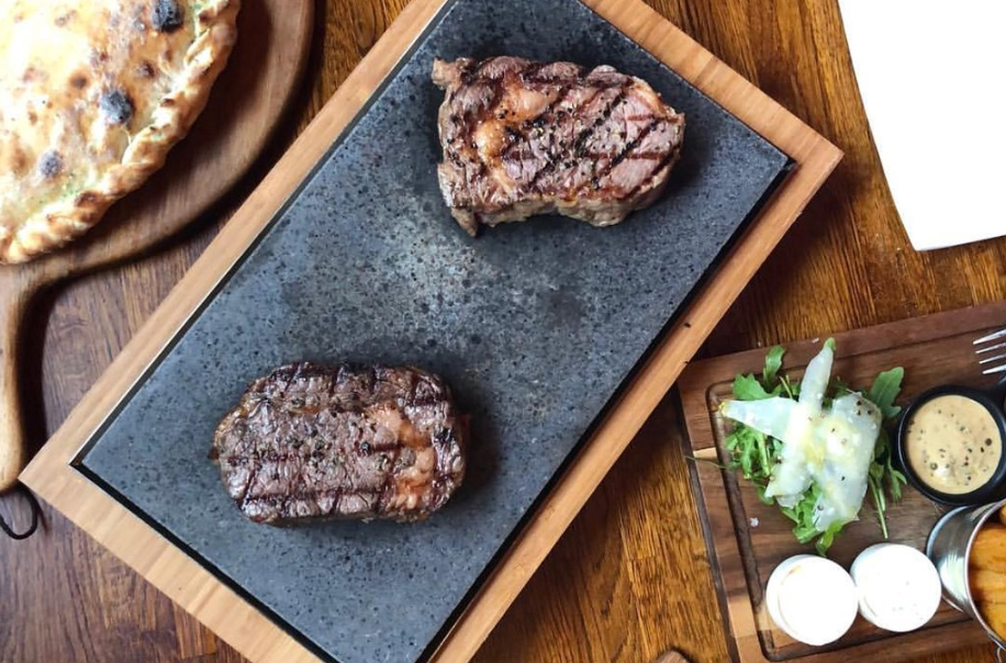 The SteakStones Raised Sharing Steak Plate